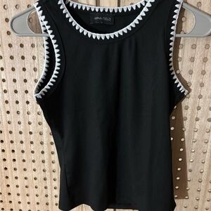 Black Sleeveless Top with White Trim